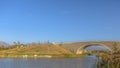 Scenic view with arched bridge over Oquirrh Lake Royalty Free Stock Photo