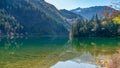 Jiuzhaigou s Arrow Bamboo Lake, nestled among majestic mountains and vibrant autumn woods, JiuzhaiGou Valley National Park, China Royalty Free Stock Photo