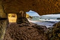 Scenic view of Batata beach under the golden cliffs in Lagos, Algarve, Portugal