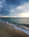 Scenic view of beach against storm clouds Royalty Free Stock Photo