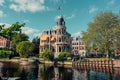 Scenic view of beautiful buildings along a river in Amsterdam, Netherlands