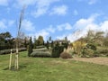 Scenic View of a Beautiful English Style Hyde Hall Garden with Green Lawn and blue sky, RHS garden,