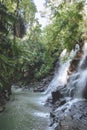 scenic view of beautiful Kanto Lampo Waterfall, green plants and rocks, Royalty Free Stock Photo