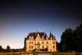 Scenic view of a beautiful mansion exposed to sunlight with the beautiful stars in the background