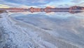 Scenic view of beautiful mountains reflecting in lake of Bonneville Salt Flats at sunset, Wendover, Western Utah, USA, Royalty Free Stock Photo