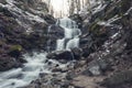 Scenic view of the beautiful Shypit waterfall in the Carpathian mountains, winter landscape Royalty Free Stock Photo