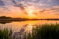 Scenic view of beautiful sunset or sunrise above the pond or lake at spring or early summer evening Royalty Free Stock Photo