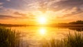 Scenic view of beautiful sunset or sunrise above the pond or lake at spring or early summer evening. Royalty Free Stock Photo