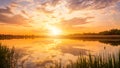 Scenic view of beautiful sunset or sunrise above the pond or lake at spring or early summer evening. Royalty Free Stock Photo