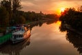 Scenic view of Bega river Timisoara at sunset. Royalty Free Stock Photo