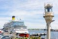 Scenic view big modern cruise liner ship docked at car tourist bus parking Oslo quay Kiel Fjord harbor of Baltic sea in Royalty Free Stock Photo