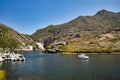 Scenic view of boats moored at the bank of Ezaro river in Spain