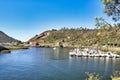 Scenic view of boats moored at the bank of Ezaro river in Spain