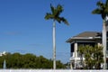 Scenic view of Bonita Springs with palm trees and raised house