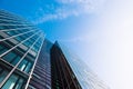 Scenic View from the Bottom of a Beautiful Modern Business Building with Blue Sky Royalty Free Stock Photo