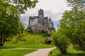 Scenic view of the Bran Castle and park in its foreground Royalty Free Stock Photo