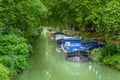 Scenic view of Canal de Brienne with barges moored, Toulouse France Royalty Free Stock Photo