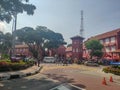 Malacca,Malaysia - June 24 2019: Scenic view of the Christ Church Malacca and Dutch Square,people can seen exploring around the it Royalty Free Stock Photo