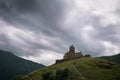 Scenic view on the church on green hill with small country road Royalty Free Stock Photo