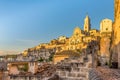 The city of Matera in Italy in warm yellow sunset light Royalty Free Stock Photo