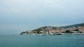 Scenic view of the city with mountain background, beautiful cityscape with boats, sunny day, Trogir, Dalmatia, Croatia