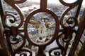 Scenic view of cityscape look through cloister with clock tower in curved steel frame from st. paul`s cathedral. London, United