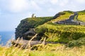 Scenic view of the Cliffs of Moher and O\'Brien\'s Tower at sunrise Royalty Free Stock Photo