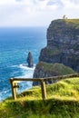 Scenic view of the Cliffs of Moher and O\'Brien\'s Tower at sunrise Royalty Free Stock Photo