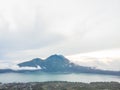 Scenic view of clouds and mist at sunrise from the top of mount Batur Kintamani volcano , Bali, Indonesia. Royalty Free Stock Photo