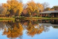 Beautiful fall landscape with a bridge in the city park Royalty Free Stock Photo