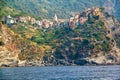 Scenic view of colorful village Vernazza and ocean coast Royalty Free Stock Photo