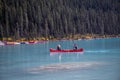 Scenic view of a couple canoeing on Lake Louise in Banff National Park, Canada