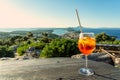 Cocktail with scenic view of the croatian losinj islands in the kvarner gulf daytime