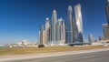 Scenic view of Dubai Marina Skyscrapers with boats , Skyline, View from sea, United Arab Emirates