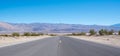 Scenic view of an empty highway against the blue sky Royalty Free Stock Photo