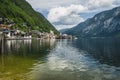 Scenic view of famous Hallstatt lakeside town reflecting in Hallstattersee lake in the Austrian Alps. Salzkammergut Royalty Free Stock Photo