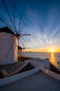 Traditional greek windmills on Mykonos island at sunrise, Cyclades, Greece Royalty Free Stock Photo