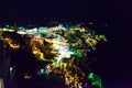 Scenic view of Fira town night lights Santorini summertime Greece Royalty Free Stock Photo