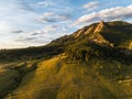 Scenic view of the Flatirons of Boulder, Colorado on a sunny day under a bright cloudy sky Royalty Free Stock Photo