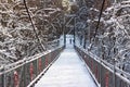 Scenic view of footbridge in the middle of snowy nature in winter. Obninsk, Russia