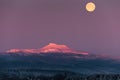 Scenic view of the full moon above the Camels Hump Mountain during sunrise Royalty Free Stock Photo