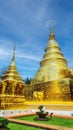 Golden stupas inside compound of famous ancient landmark Wat Phra Singh buddhist temple, Chiang Mai, Thailand