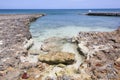 Grand Cayman Island Rocky Shore And A Pier Royalty Free Stock Photo