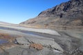 Scenic view - gray-silvery sand on shore Lake Akkol (Ak-Kol, Akkul) in the Altai Mountains, South Chuya Range, Siberia