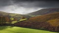 Scenic view of green hills in the Forest of Bowland, Lancashire, England on a cloudy day