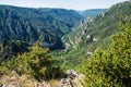 Scenic view of a green mountain range seen from Sublime Point in Lozere, France