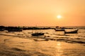 Traditional thai long tail boats at sunset, Long Beach, Ko Lanta, Thailand. Royalty Free Stock Photo