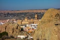 Scenic view of Guadix, Spain, showcasing the town, fortress, Alcazaba, and cathedral from a rock Royalty Free Stock Photo