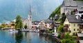 Scenic view of Hallstatt lakeside town in the Austrian Alps on beautiful day in autumn. Hallstatt, situated on Hallstatter See, a