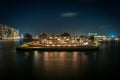 Scenic view of highrise buildings and the city skyline with lights at night Royalty Free Stock Photo